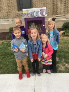 Kids Visit the Little Free Library on Clay Street