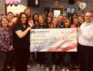 PreK staff accepts $300 check from Perez Insurance