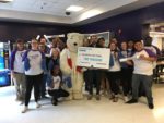 CHS Video Production students accept $2,000 check from Powerade